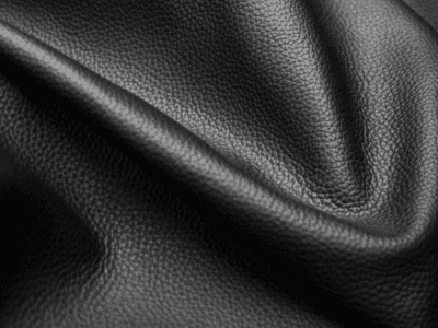 Top grain leather textile laid flat