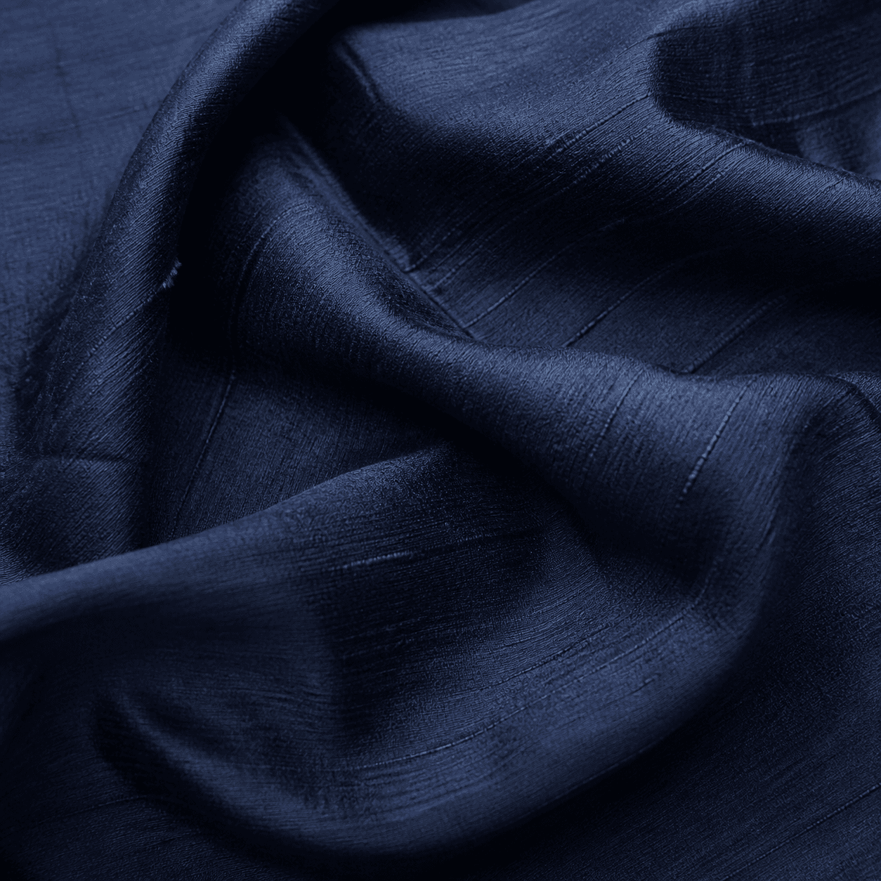 Raw silk textile laid flat